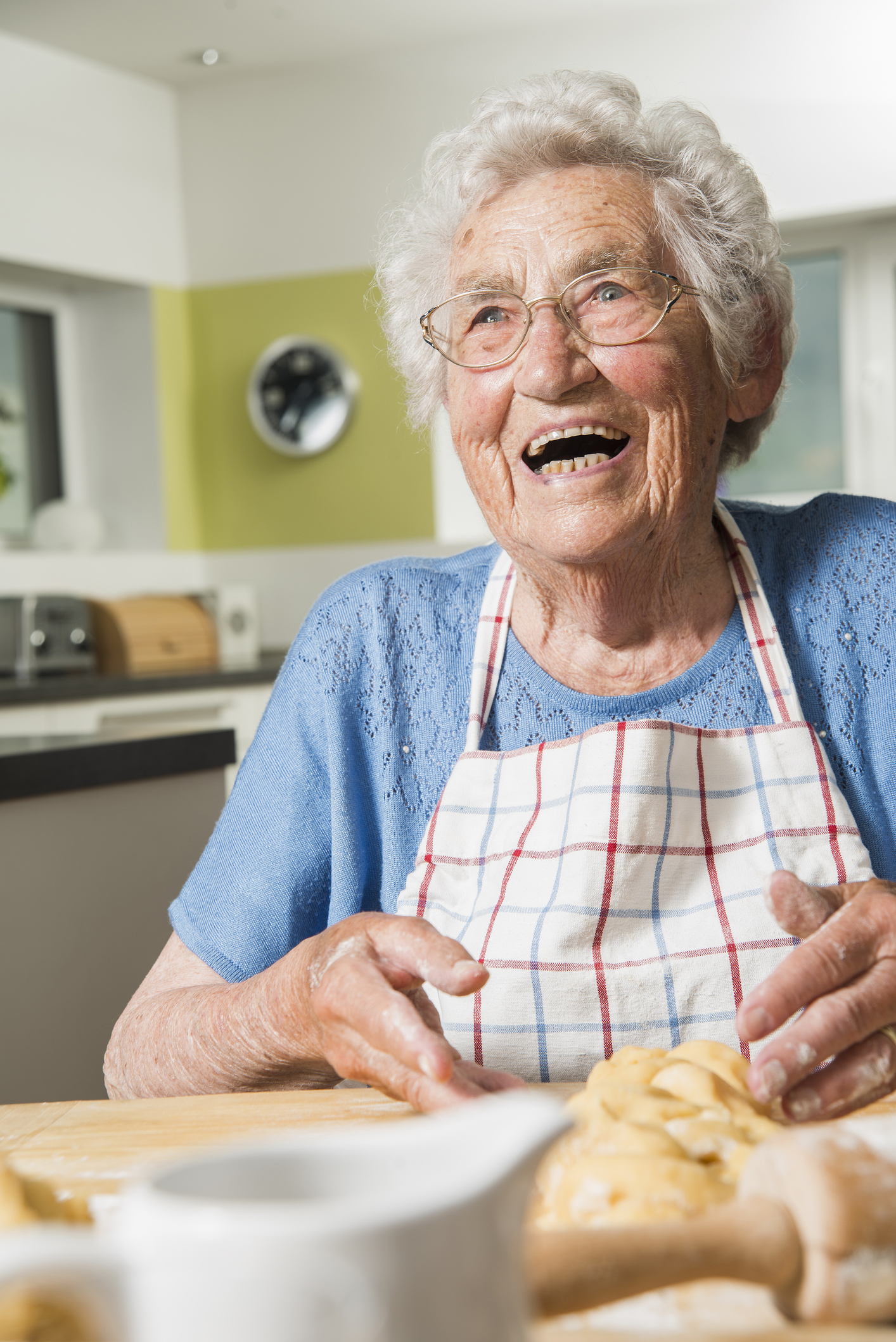 adult,female,person,woman,face,happy,head,laughing,glasses,cooking