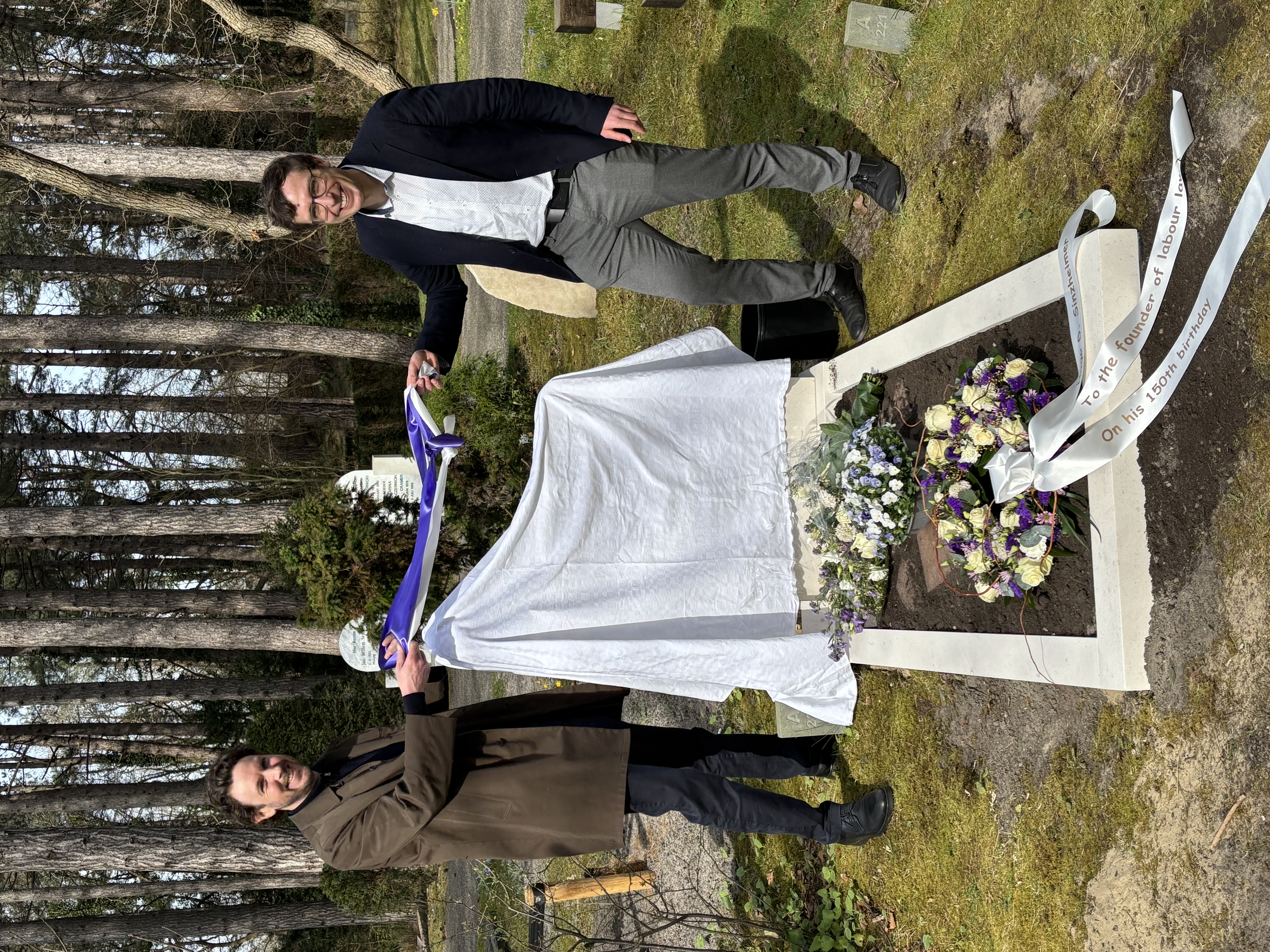 flower arrangement,flower bouquet,blazer,coat,shoe,adult,male,man,person,formal wear