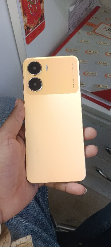 electronics,phone,mobile phone,baby,person,iphone,credit card,text