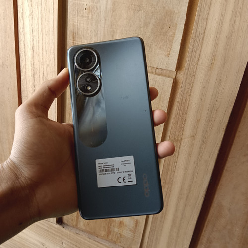 electronics,mobile phone,phone,person,indoors,interior design,camera