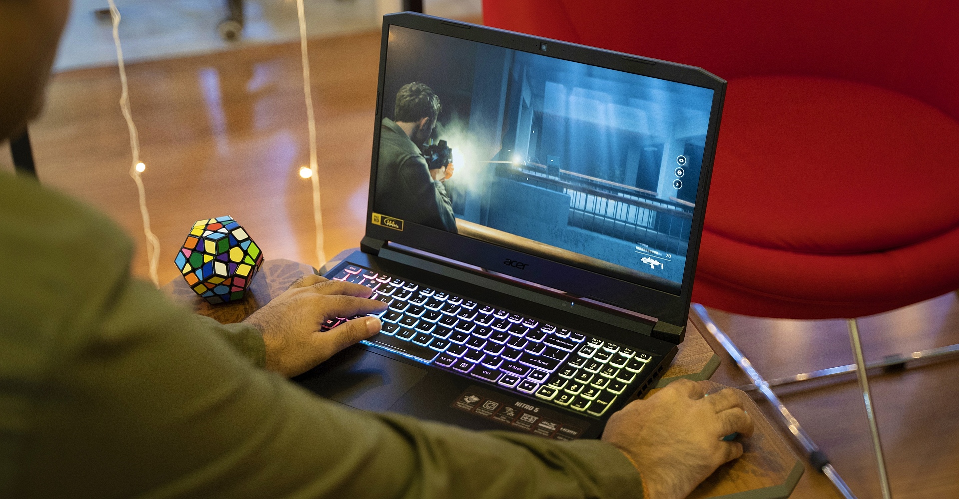 computer,laptop,pc,computer keyboard,adult,male,man,person,monitor,pen