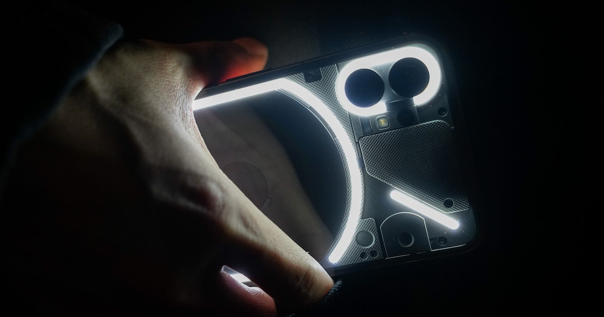 adult,male,man,person,camera,electronics,body part,hand,light,finger