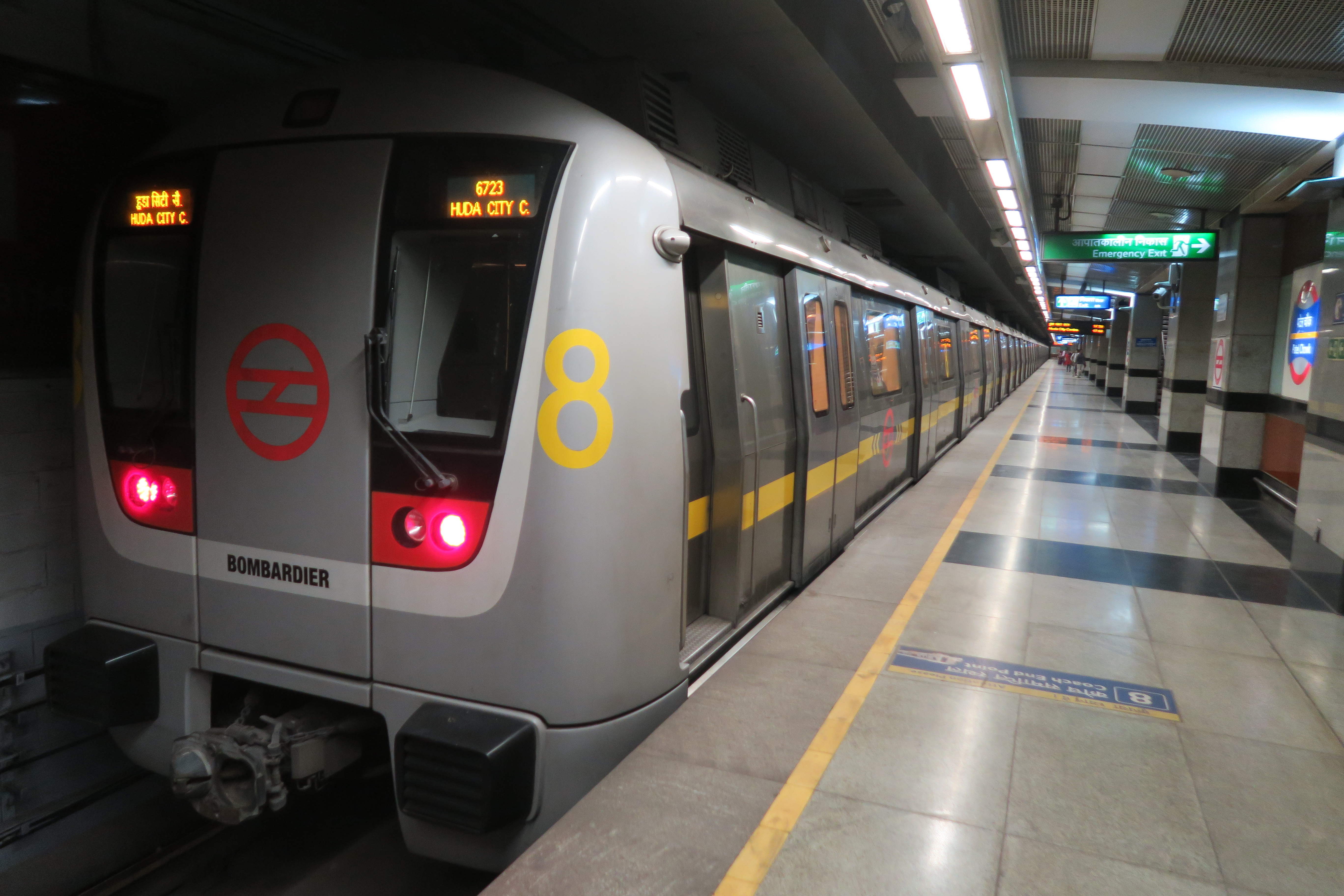 railway,terminal,train,train station,transportation,vehicle,subway,monitor,screen,person