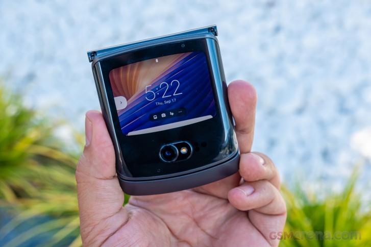 body part,finger,hand,person,electronics,mobile phone,phone,photography,baby,hand-held computer