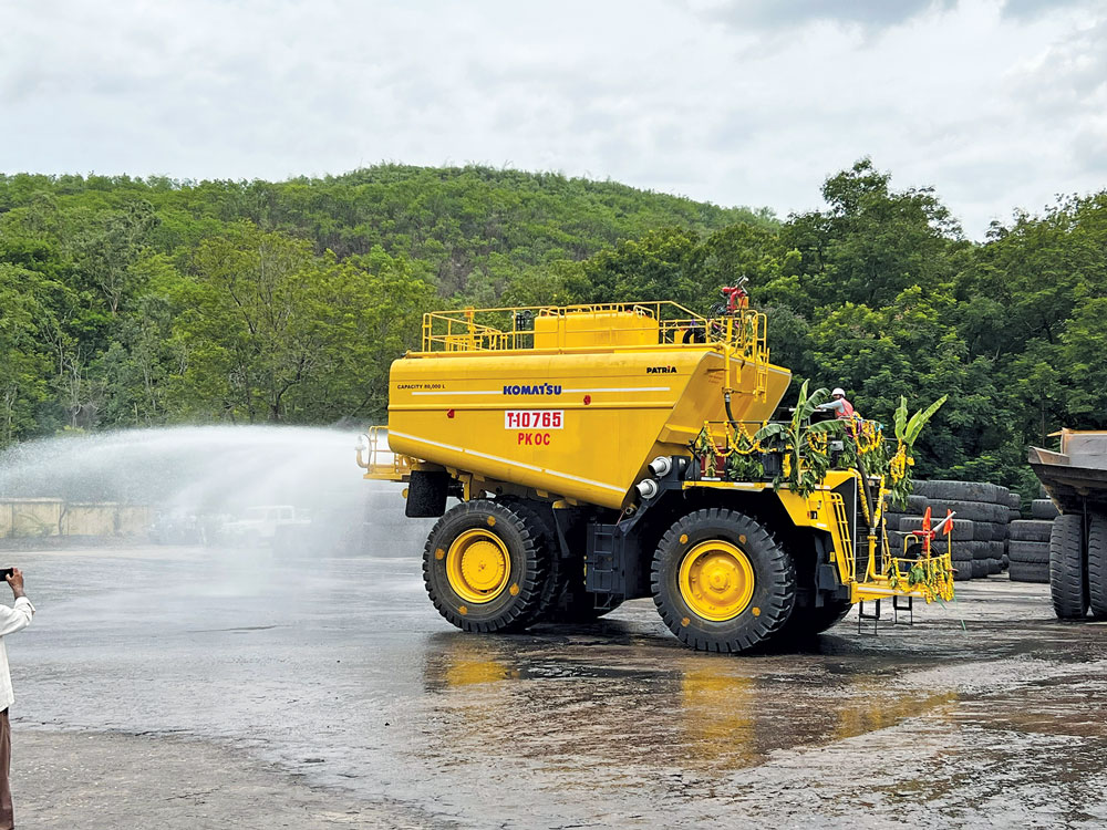 machine,wheel,person,bulldozer,transportation,vehicle,truck