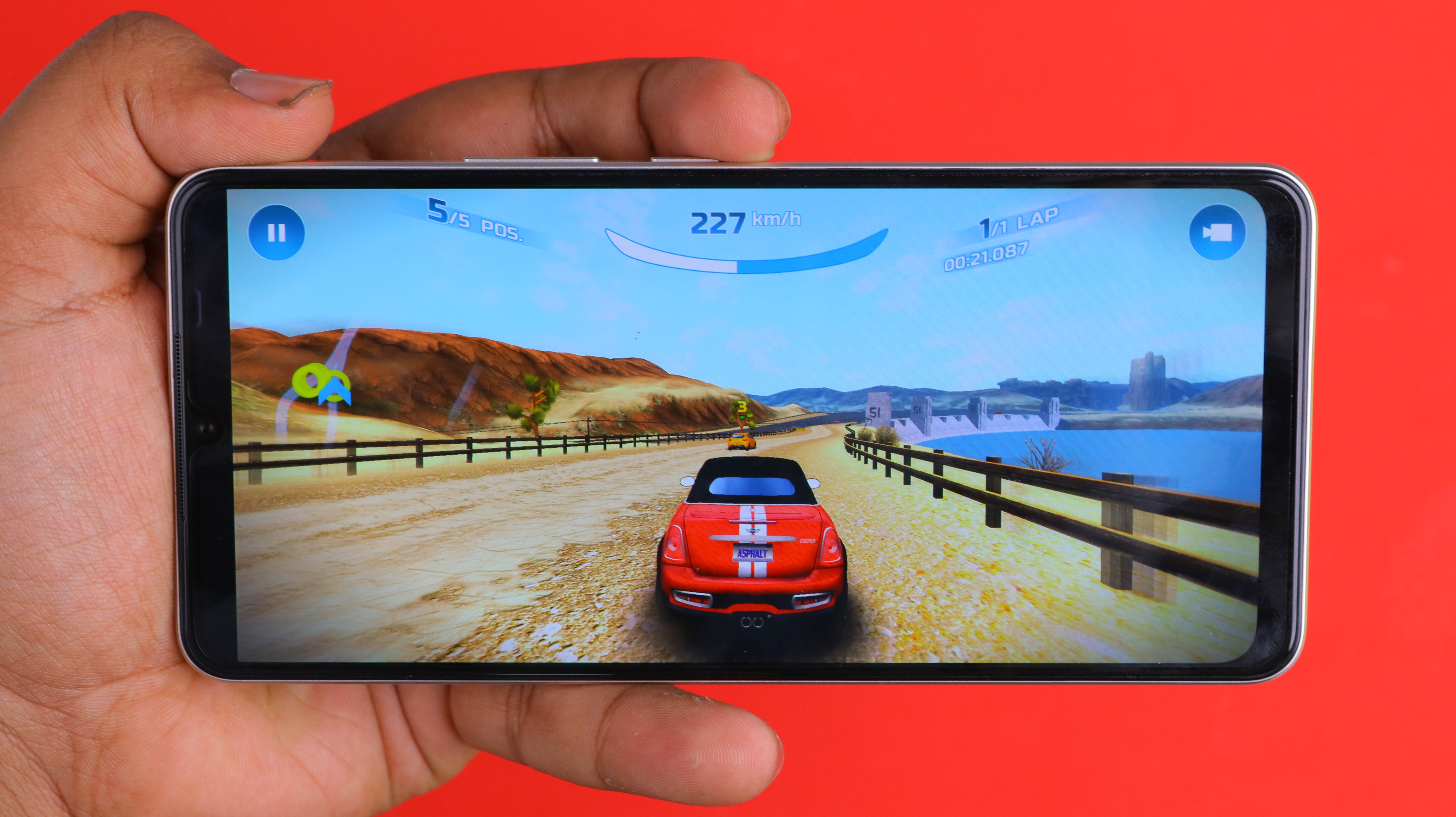 electronics,mobile phone,phone,car,screen,finger,computer hardware,monitor,texting,coupe