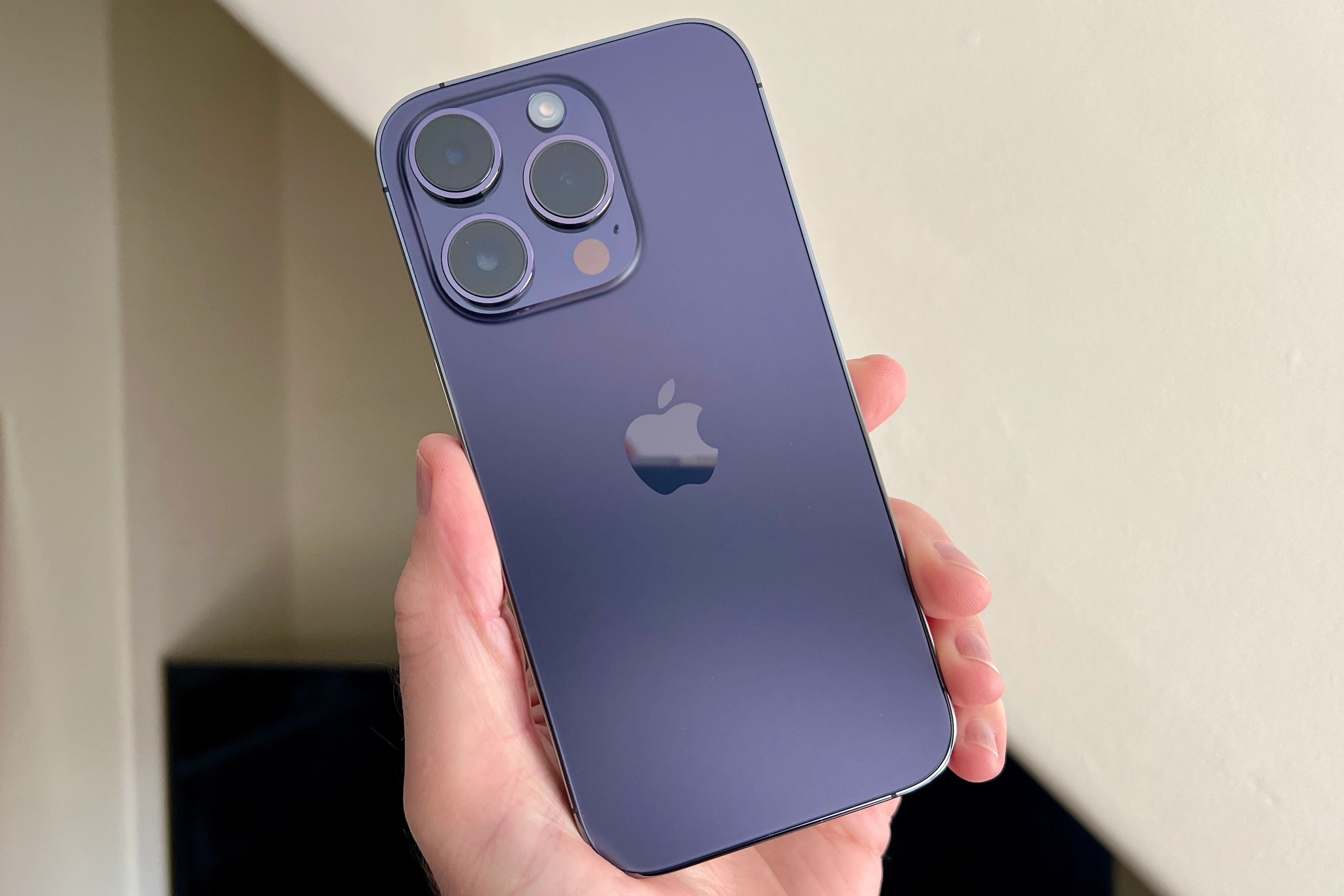 iPhone-14-Pro-Back-Purple-Hand.webp