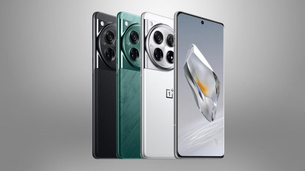 electronics,mobile phone,phone,plant,potted plant,person,computer hardware,hardware,speaker