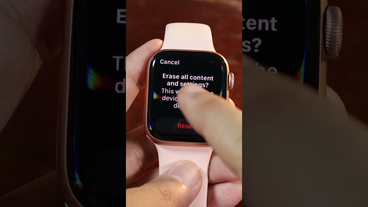 electronics,mobile phone,phone,wristwatch,arm,body part,person,digital watch