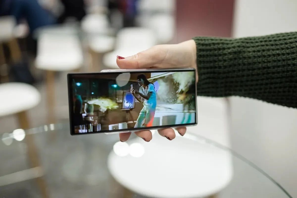 electronics,mobile phone,phone,person,iphone