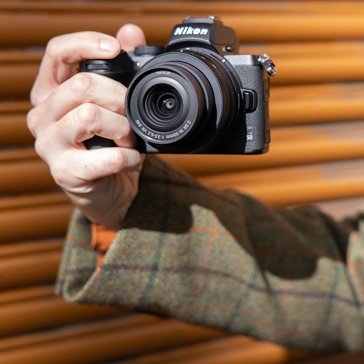 photography,camera,electronics,person,body part,finger,hand,digital camera,video camera