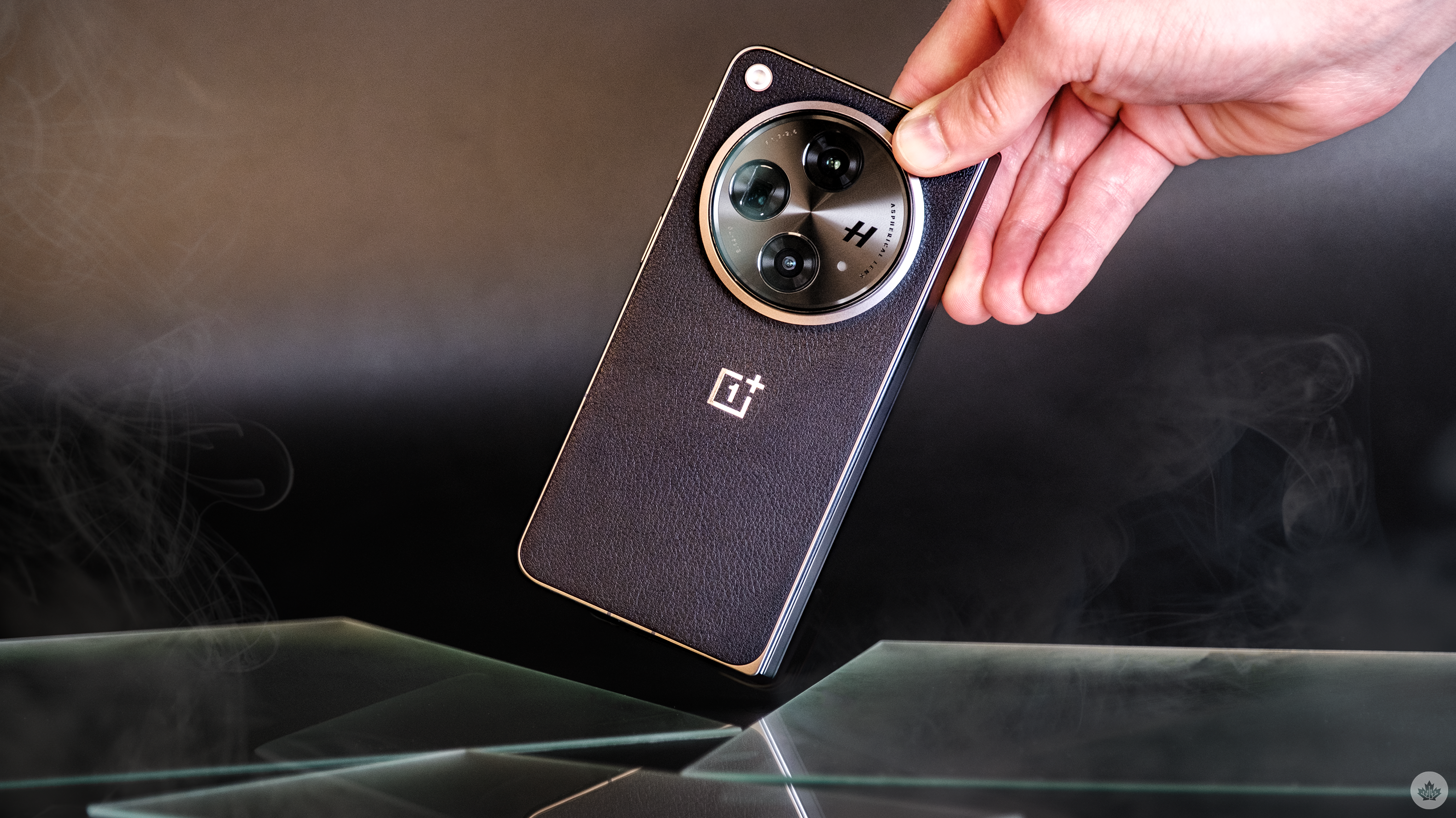 electronics,phone,mobile phone,person,speaker,camera