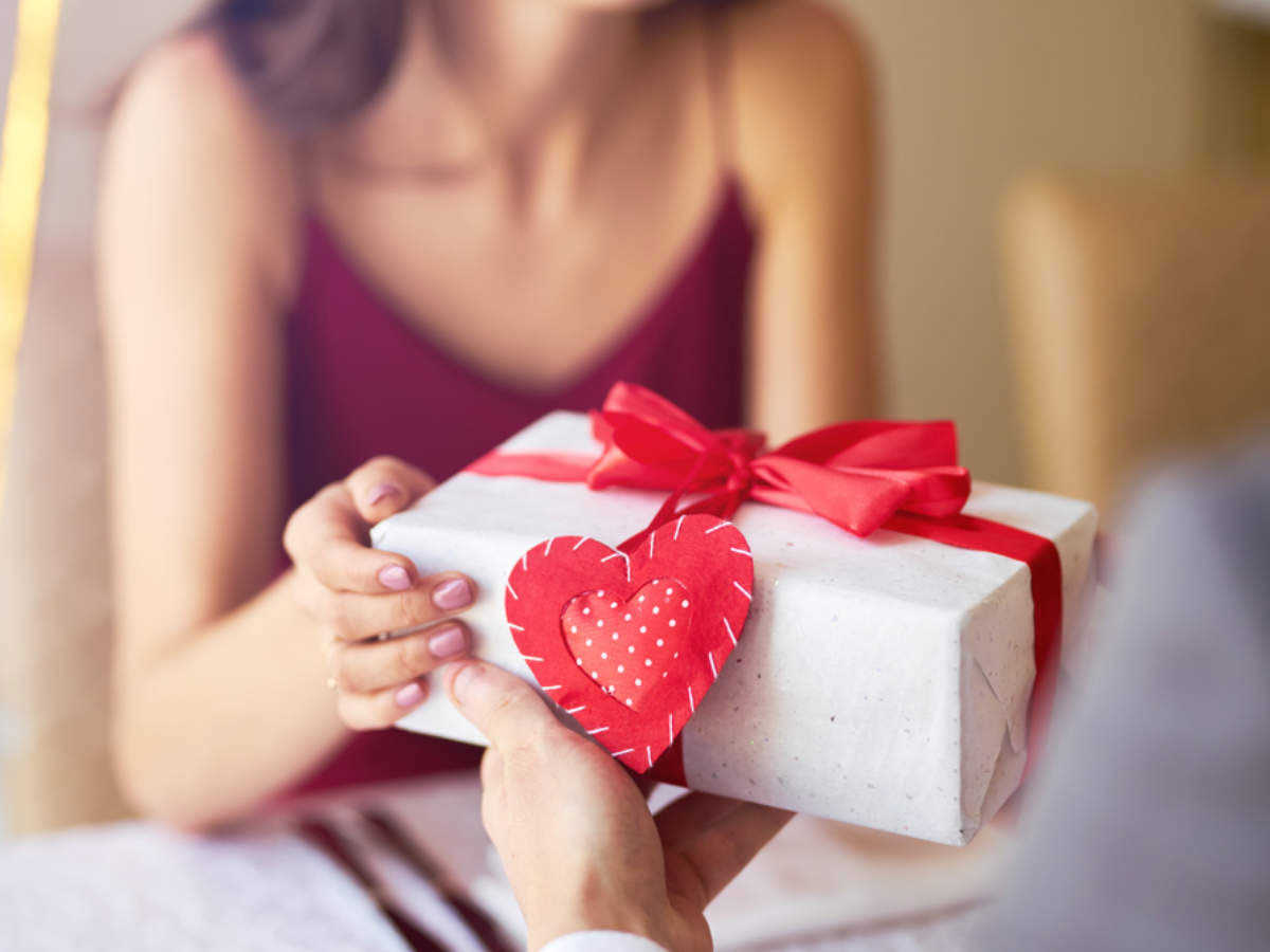 symbol,opening present,person,love heart symbol,woman,adult,female