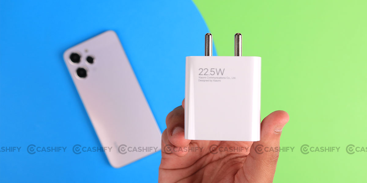 adapter,electronics,mobile phone,phone,plug,business card,paper,text