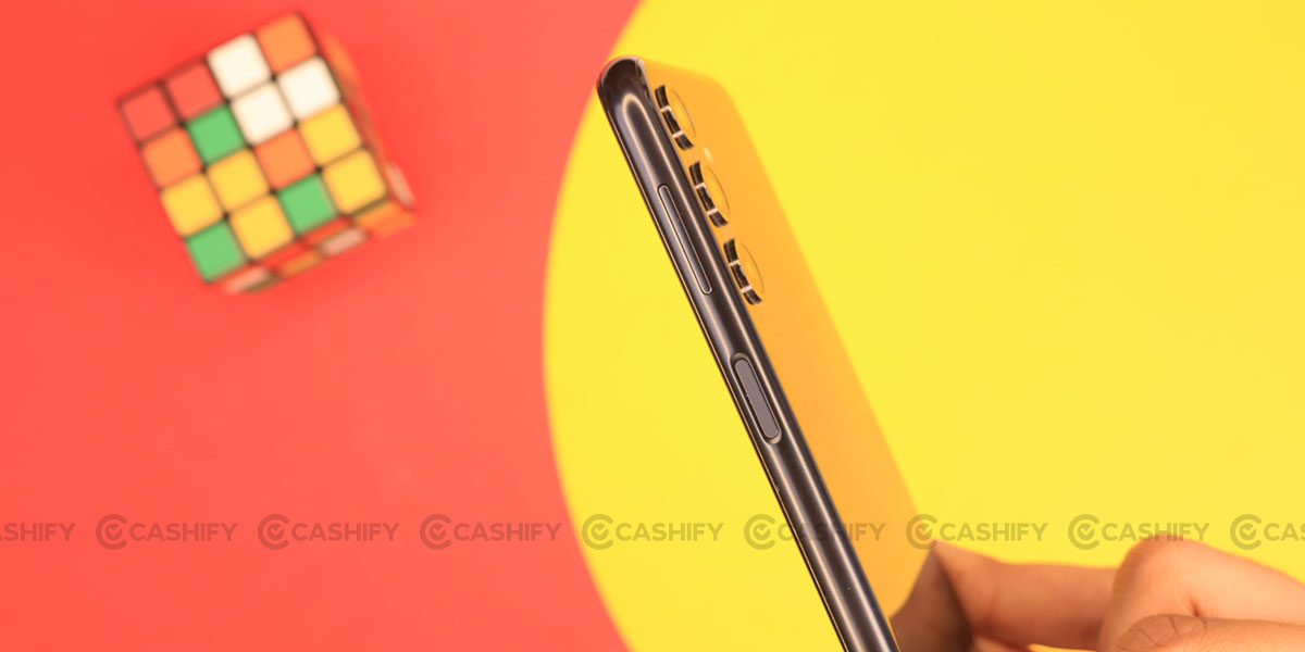 electronics,mobile phone,phone,toy,rubix cube,pencil