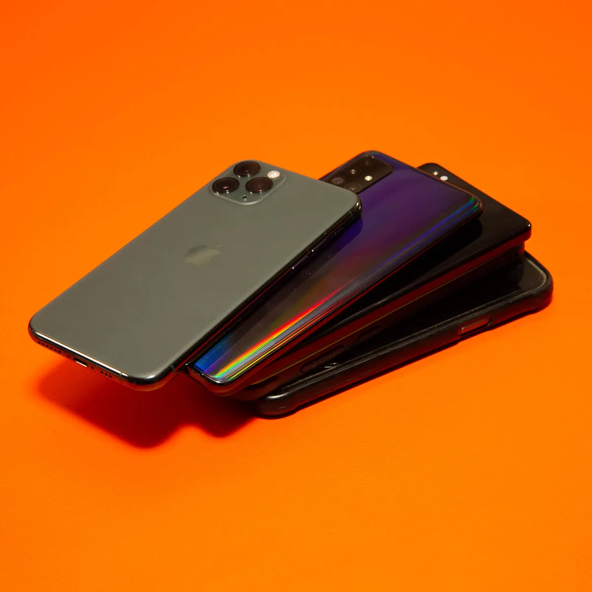 stack-of-phones-2022-rebranding-orange-03.webp