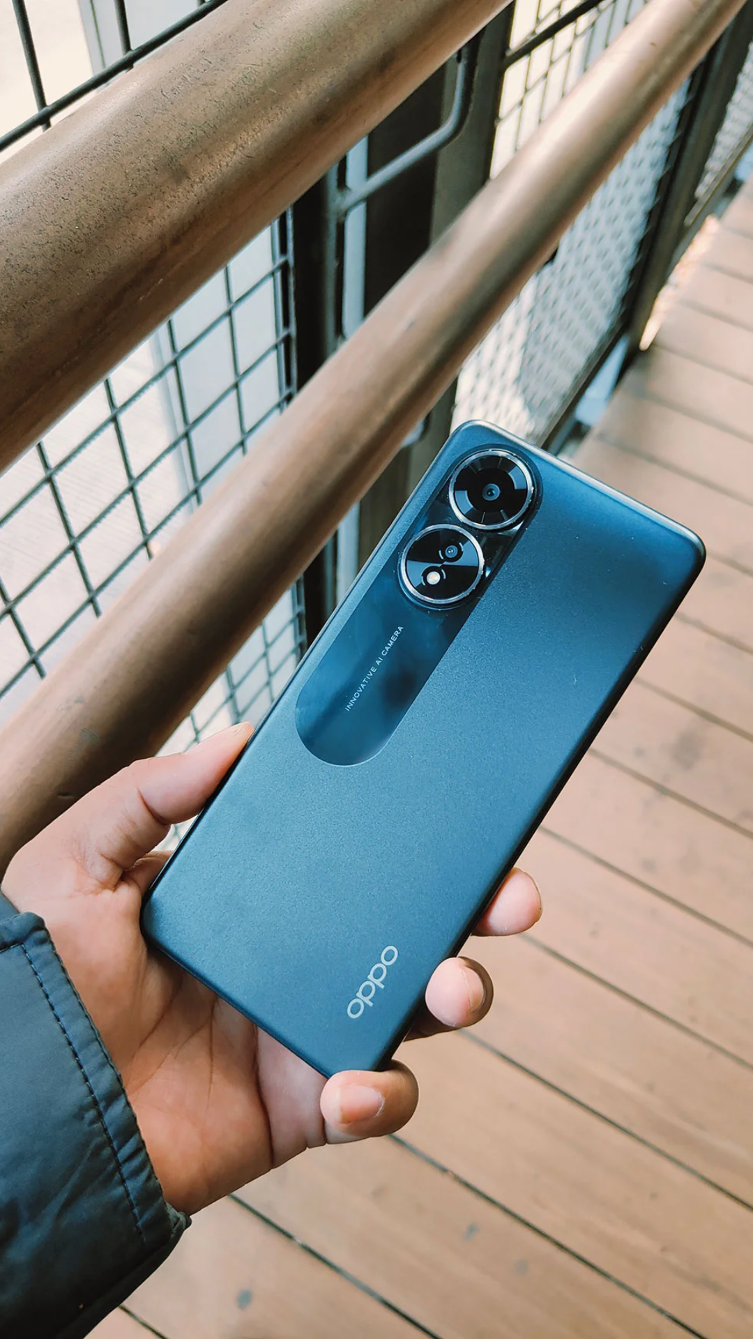 photography,electronics,phone,mobile phone,face,head,person,selfie,hardwood,wood