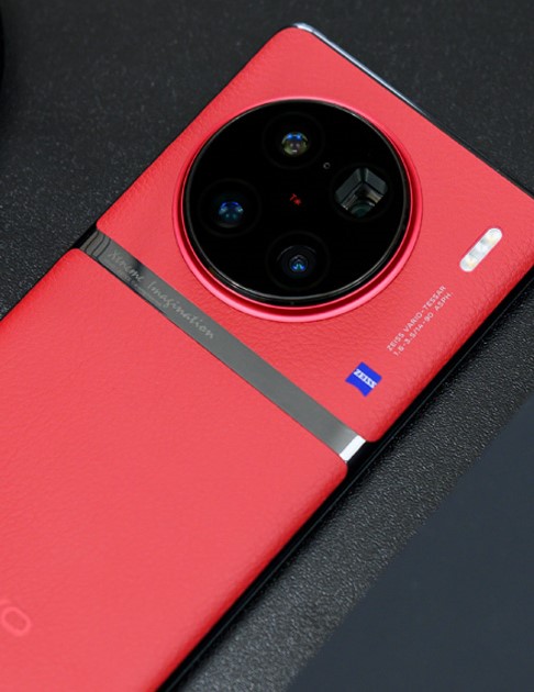 electronics,phone,mobile phone,disk,indoors,kitchen,camera,speaker