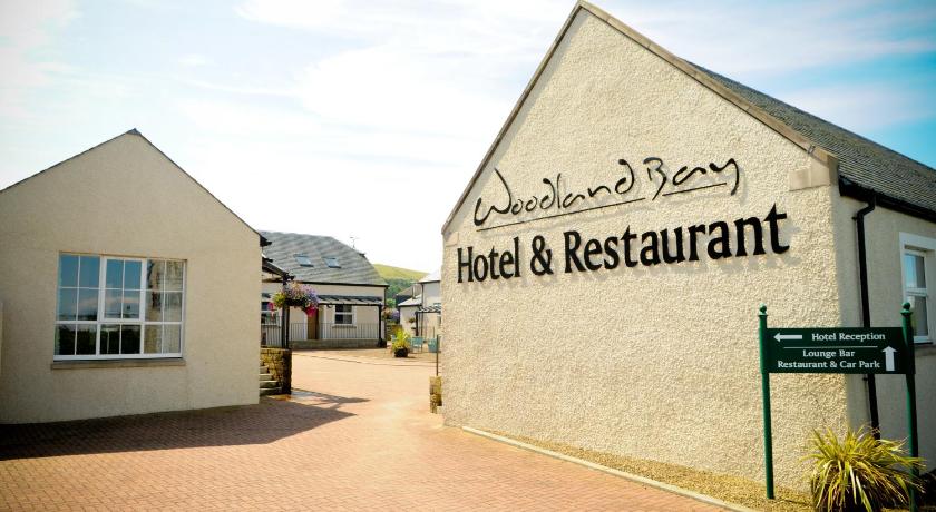hotel,sign,logo,outdoors,wall,gates,houses