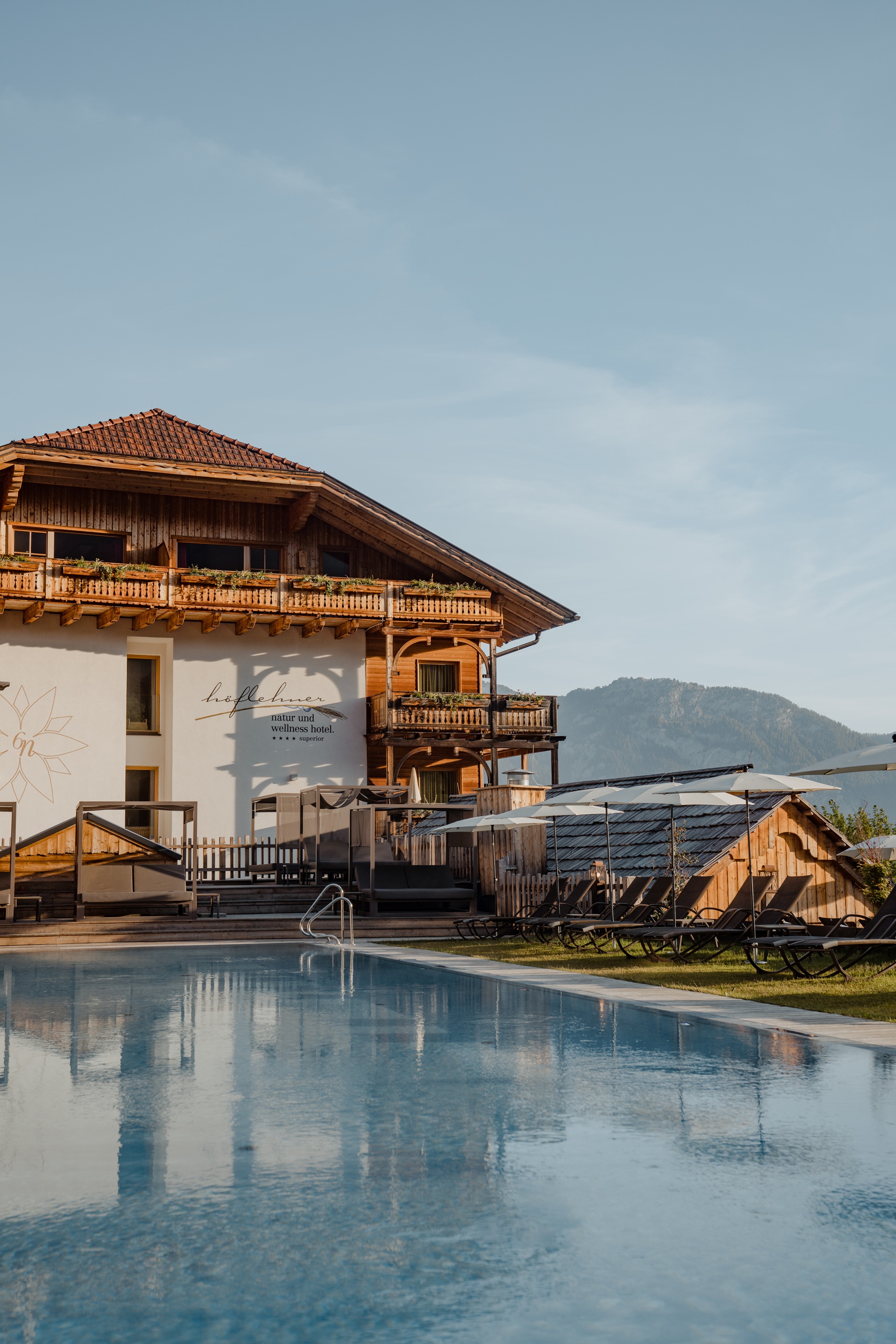 hotel,resort,outdoors,shelter,housing,villa,pool,swimming pool,water,nature