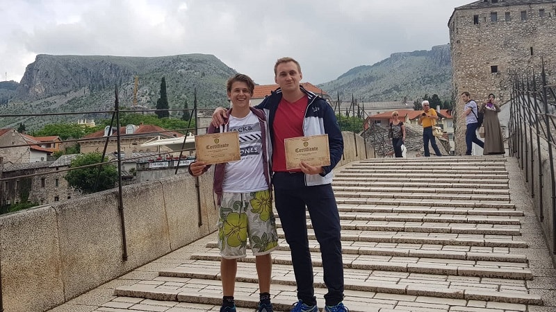 male,certifcate,holding,bridge