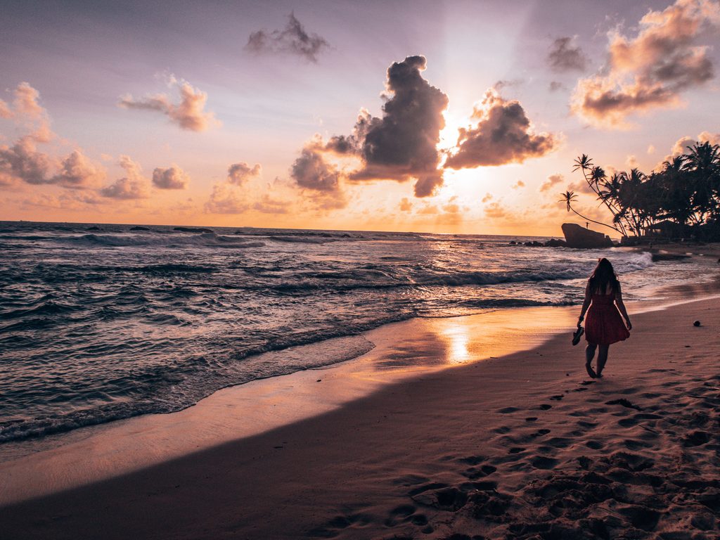 beach,sunset,sand,water,waves,person,human,waling,bare,foot